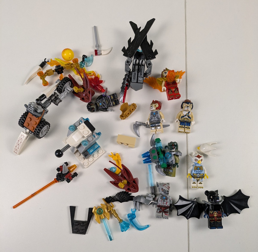Lego LEGENDS OF CHIMA: 8 Assorted Minifigures w/ Weapons and Assorted Parts